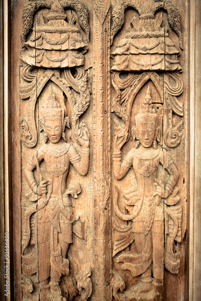 Ancient wooden crafted door panel