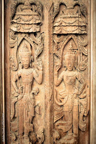 Ancient wooden crafted door panel