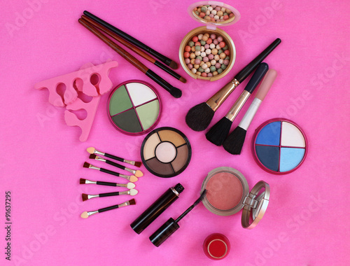 Cosmetics. The composition of eye shadow, brushes, powder, blush, mascara