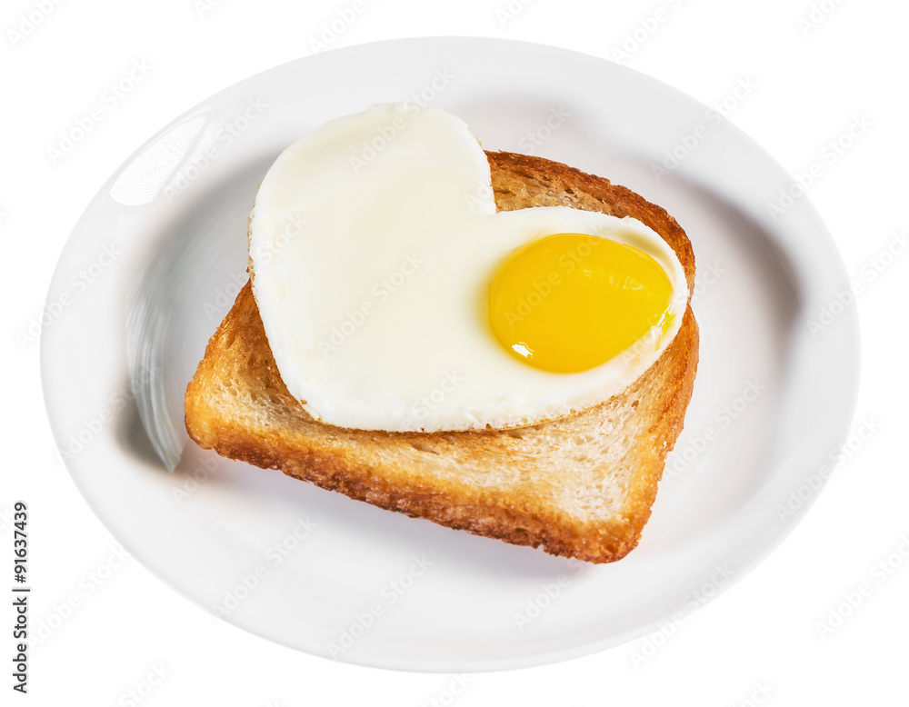 heart-shaped fried eggs and fried toast isolated heart-shaped fried eggs and fried toast isolated