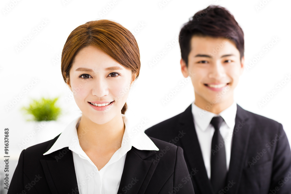happy business man and woman standing in office happy business man and woman standing in office