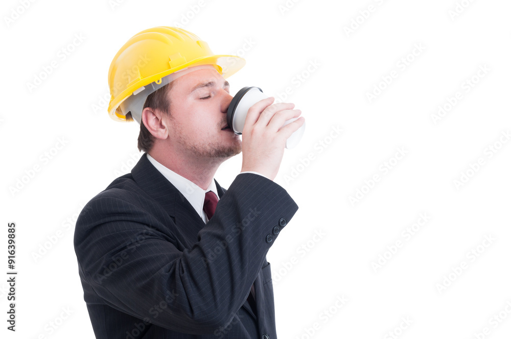 Contractor, engineer or architect drinking coffee to go Contractor, engineer or architect drinking coffee to go