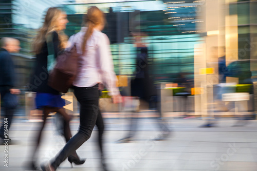 LONDON, UK - MAY 21, 2015: Canary Wharf business life. Business people going home after working day. Blur