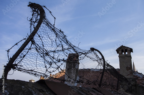 barbed wire on prison brick wall 
 photo