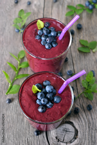 Glasses of blueberry smoothie