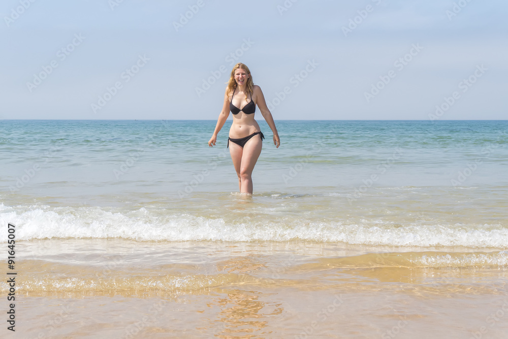 Beautiful young girl enjoying the beach in summer Beautiful young girl enjoying the beach in summer