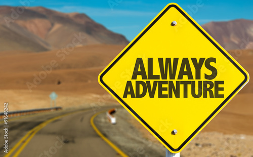 Always Adventure sign on desert road