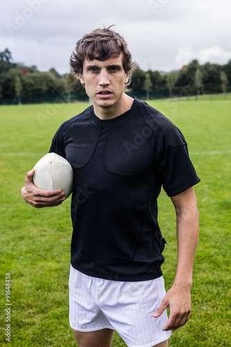 Rugby player scowling at camera © WavebreakMediaMicro