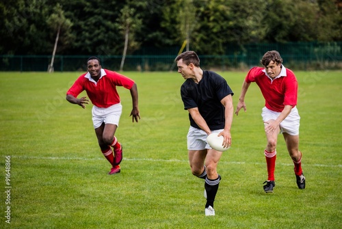 Rugby players running during game © WavebreakMediaMicro