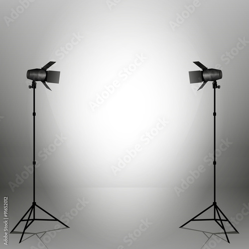 Empty photo studio with spotlights. Vector illustration. Grey backdrop.
