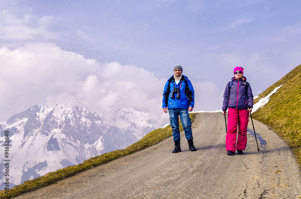 Two hikers in the Alps.