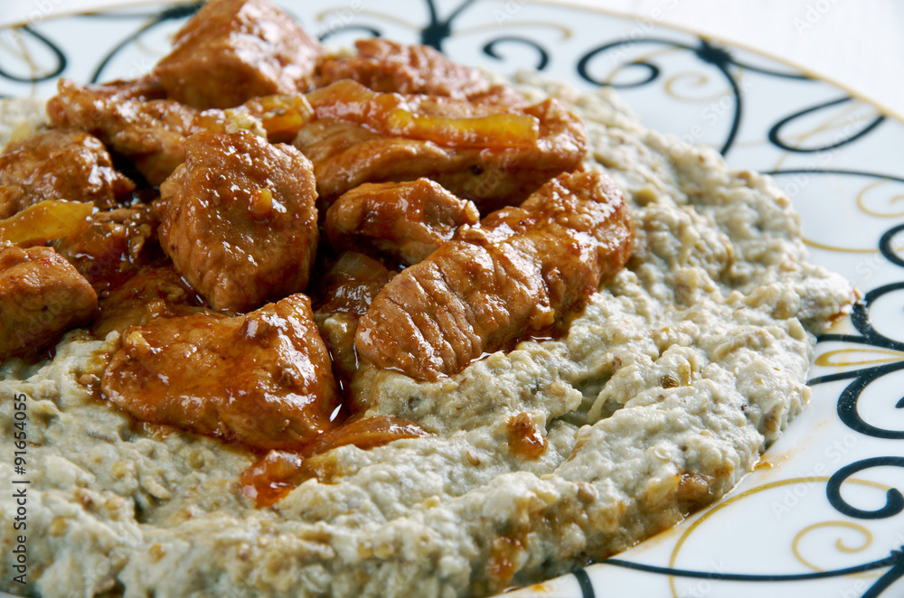 meat on a bed of baked eggplant meat on a bed of baked eggplant
