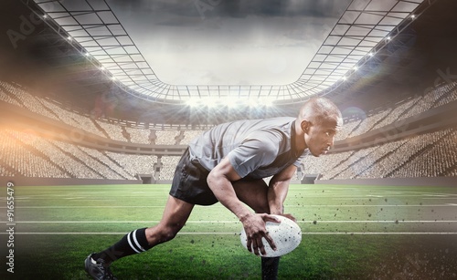 Composite image of determined athlete bending 