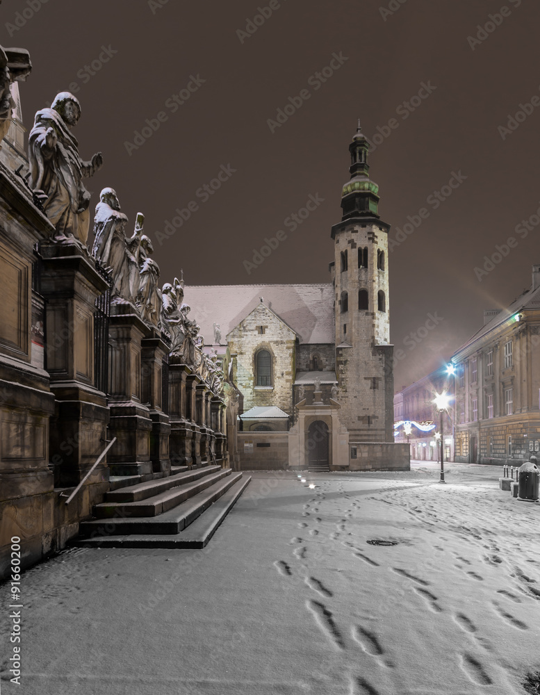 Krakow, Poland, romanesque church of Saint Andrew in snow, winter night.