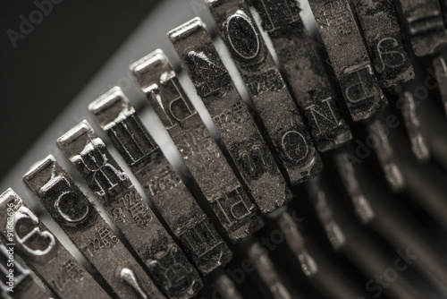 Metal letters on typewriter