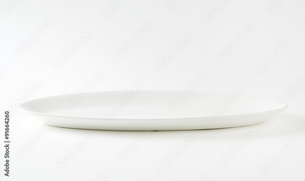 Empty oval white plate Empty oval white plate