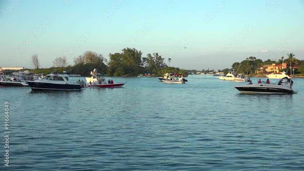 Motorboats sit in a Florida bay. Motorboats sit in a Florida bay.