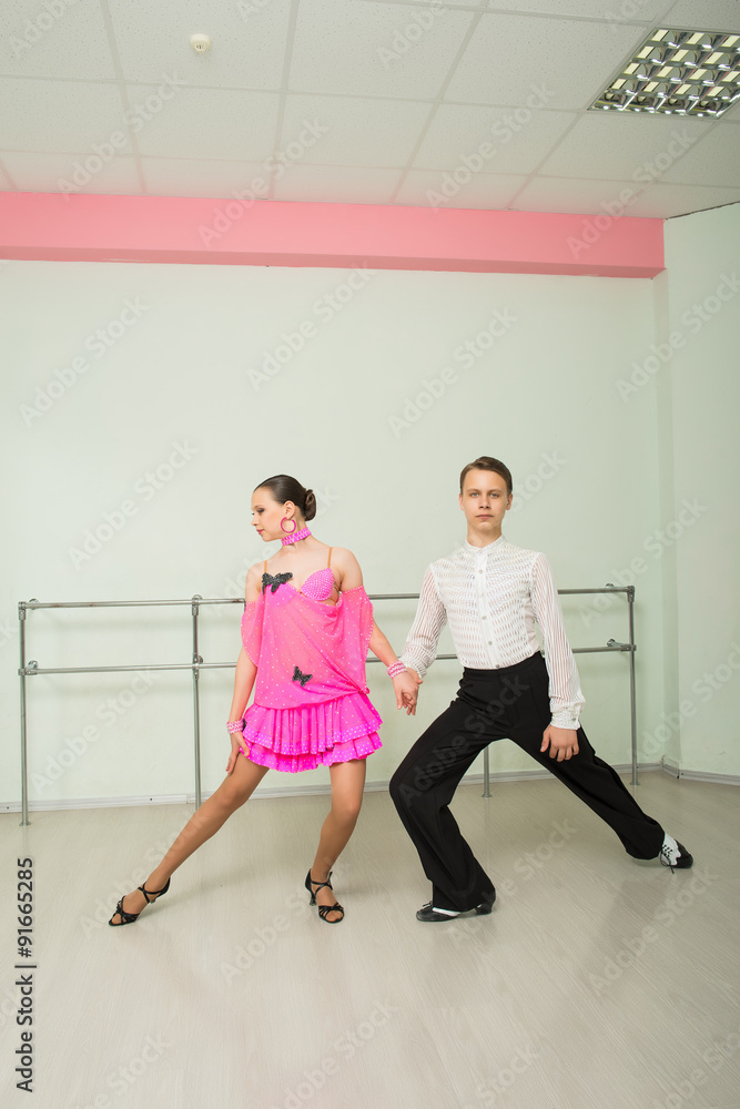 Fototapeta premium Dancing, ballroom dancing, dance studio, man and woman