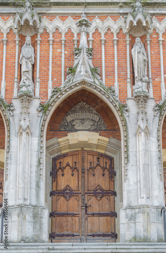 Gothic entrance to the St Joseph church in Krakow #91666464