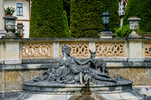 Tilgnerbrunnen fountain in the courtyard of the Hermesvilla in Vienna, Austria photo