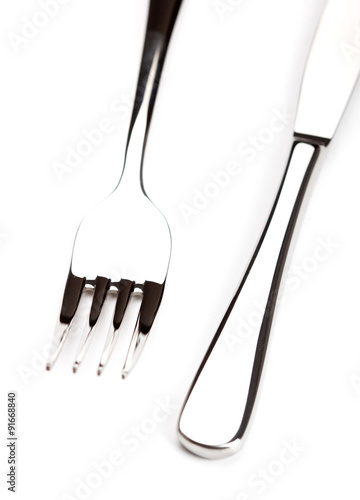 silver knife and fork on a white background 