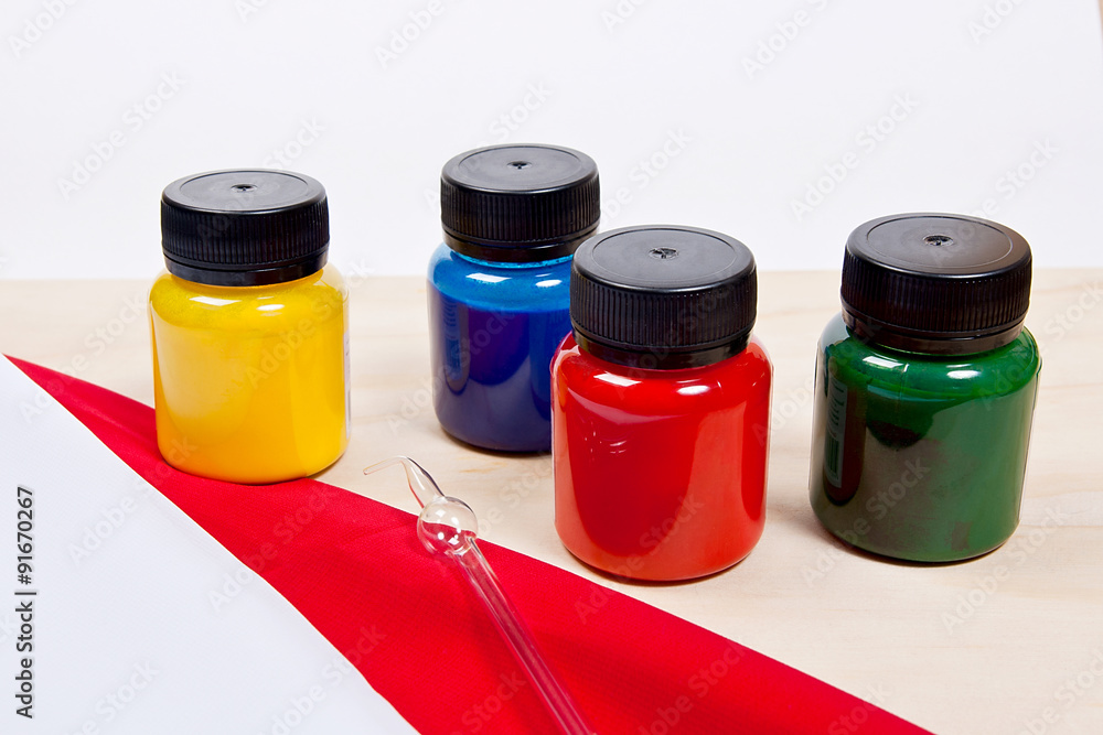 Batik equipment: artist paints and glass tube. Batik equipment: artist paints and glass tube.