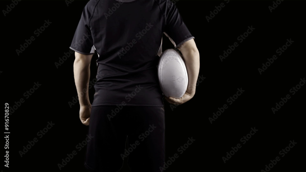 Serious rugby player with ball Serious rugby player with ball