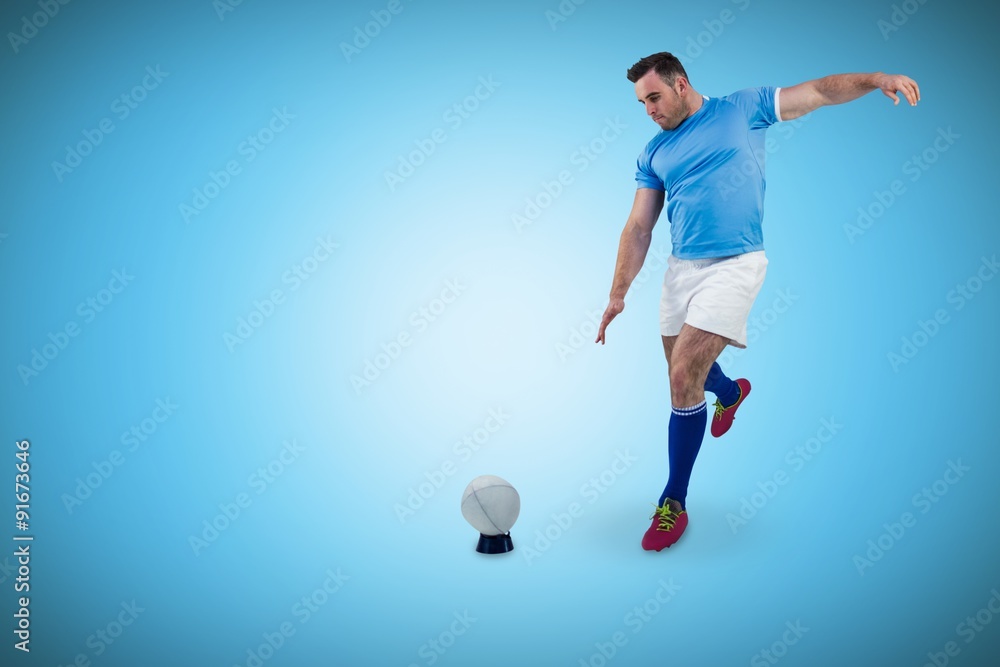 Naklejka premium Composite image of rugby player ready to kick