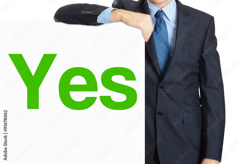 Businessman holding or showing banner with text Yes Businessman holding or showing banner with text Yes