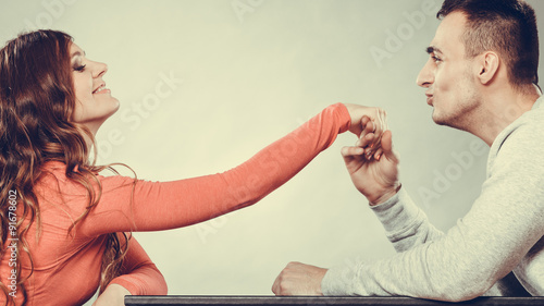 Billede på lærred Man husband kissing woman hand. Love couple.