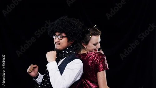 Wallpaper Mural Mixed race couple dancing at party slow motion photo booth  Torontodigital.ca