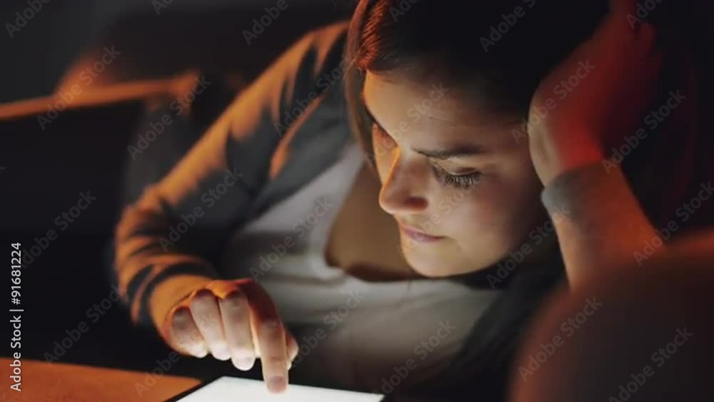 woman using tablet computer online shopping at home woman using tablet computer online shopping at home