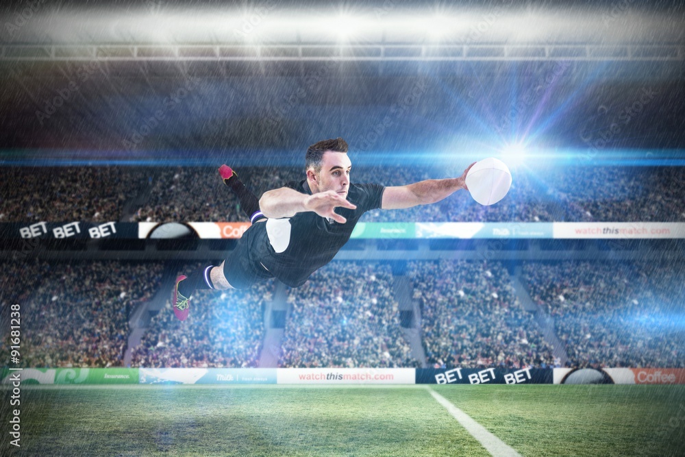 Composite image of rugby player scoring a try Composite image of rugby player scoring a try
