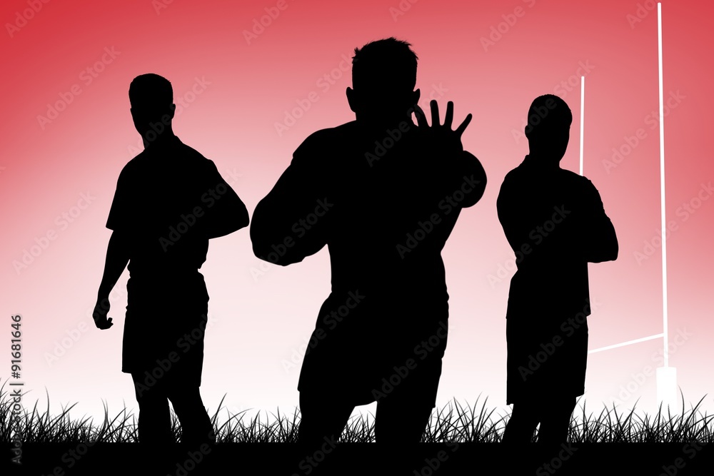 Composite image of tough rugby players Composite image of tough rugby players