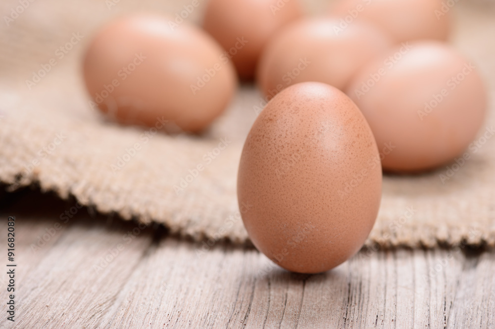 fresh chicken eggs on wood table fresh chicken eggs on wood table