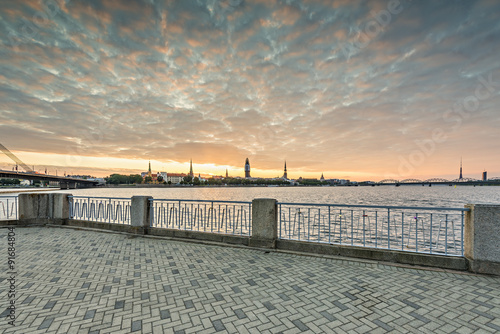 Morning view on old Riga city from left embankment of Daugava river, Latvia © sergei_fish13