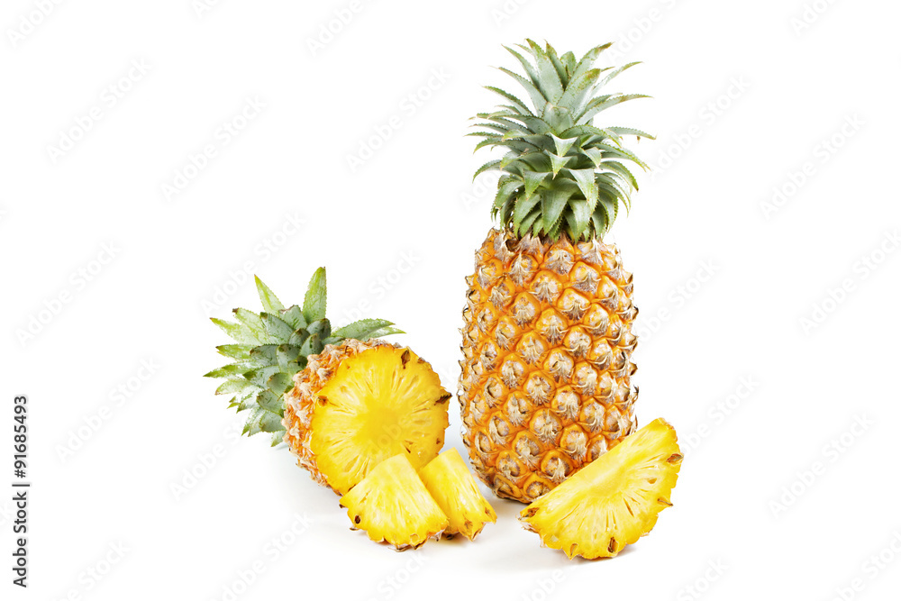 Pineapple with slices on white background. Pineapple with slices on white background.