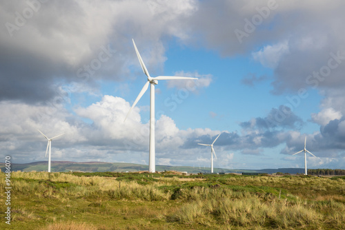 Wind turbine farm at the coast in the Lake district, Cumbria England.