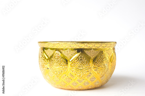 Golden  bowl in thai style isolated on white background