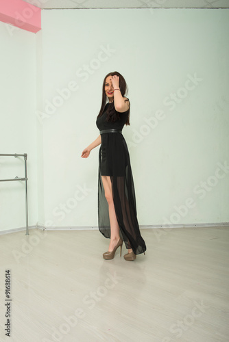 Girl dancing in dance studio, tango