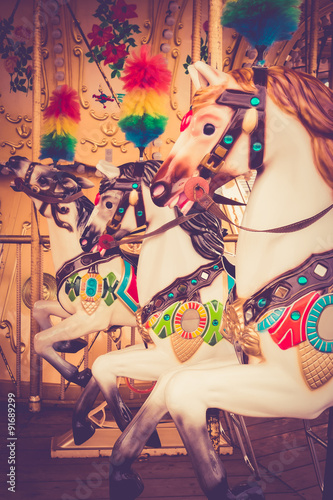 Carousel with horses vintage color
