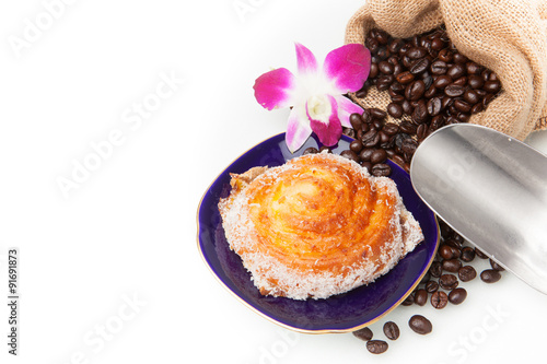 Bakery with coffee beans and flower photo