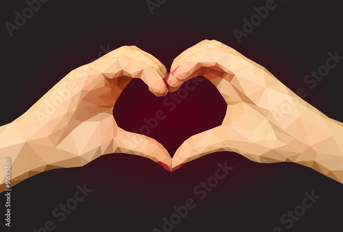 Two polygonal hands folded in the form of a heart on a black bac