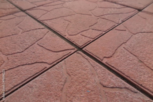 Modern concrete paving tiles of a recreational area