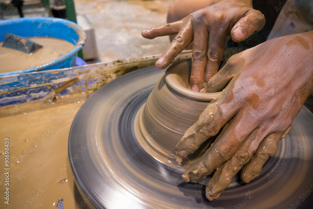Asian clay potter Asian clay potter