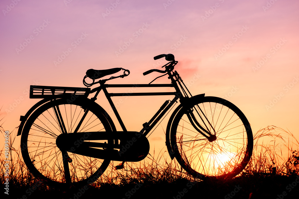 beautiful landscape image with Bicycle at sunset beautiful landscape image with Bicycle at sunset