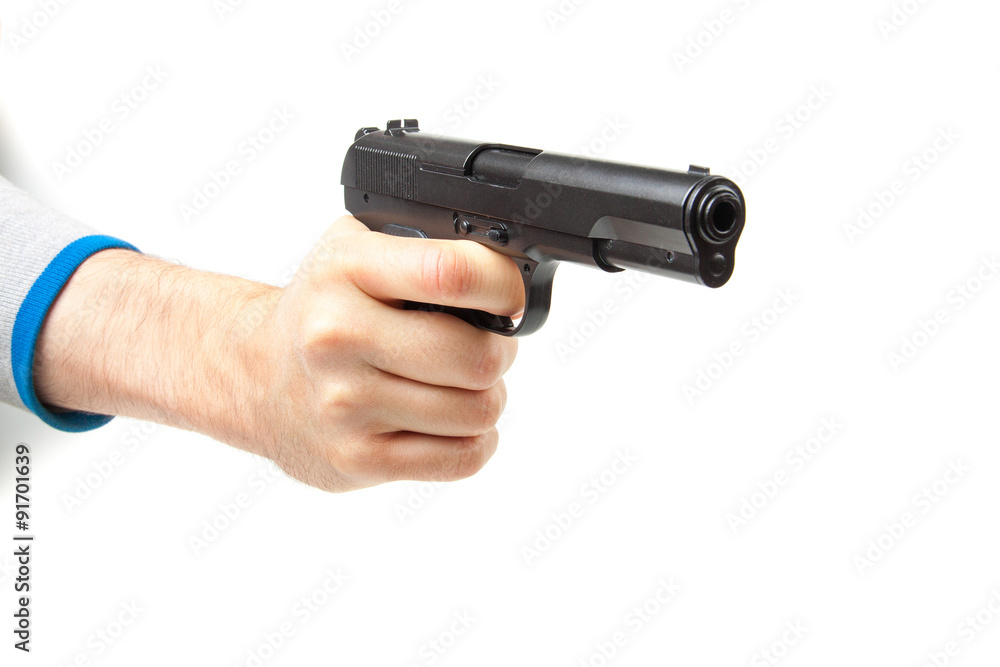 Man's hand holding gun, isolated on white. Man's hand holding gun, isolated on white.