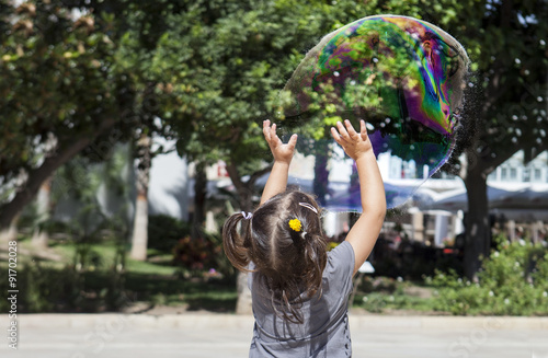 Playing in the city with a huge bubble