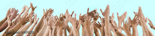 isolated lot of men's and women's hands raised up