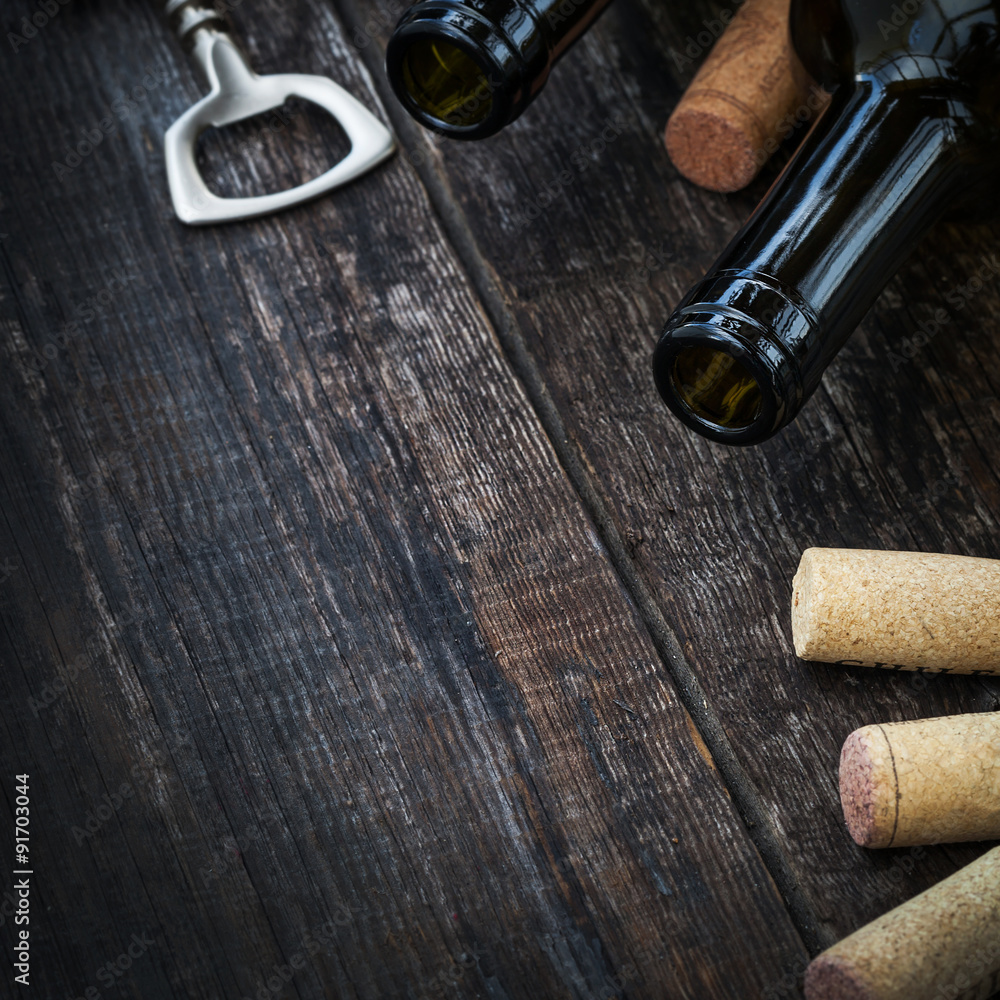 Bottle of wine,  corks and corkscrew